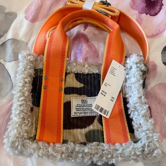 New with tags urban outfitters cross body bag. Camo and orange - Picture 1 of 3